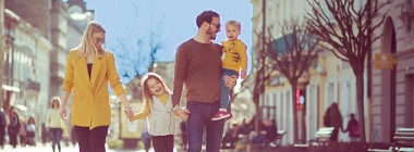 Neighborhood Navigator Solutions Page Image of family walking down neighborhood