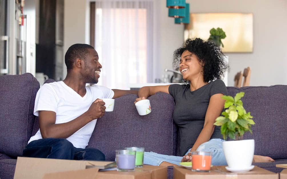 two people chatting over coffee