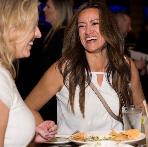 Attom Careers Employees laughing at a company event